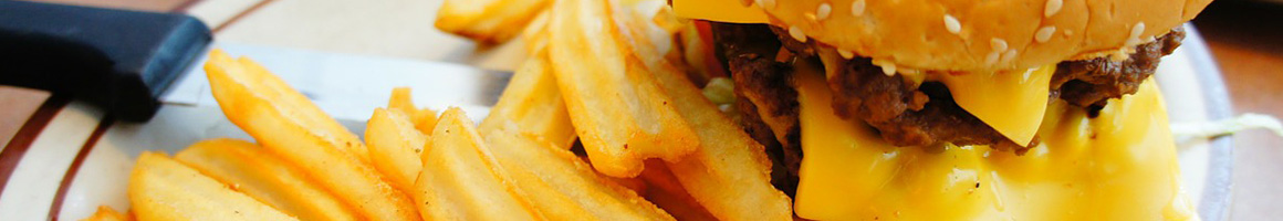 Eating American (Traditional) Burger Fast Food at D Lish's Hamburgers restaurant in Spokane, WA.